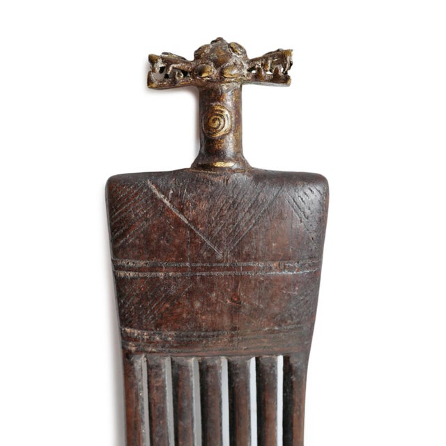 Antique carved wood hair comb from Western Africa with animal figure handle. Beautiful signs of age and use. Wonderful...