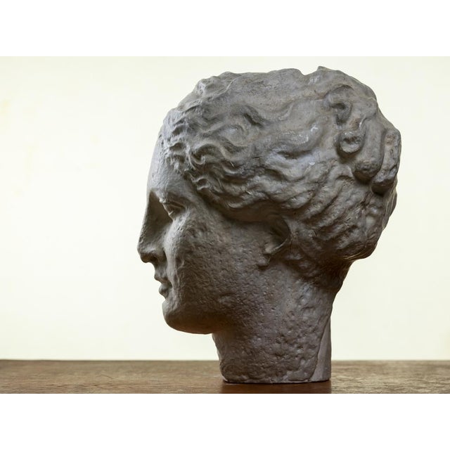 Plaster sculpture depicting the head of Hygeia, the Greek goddess of health and healing. Created in the 1930s–1940s, this...