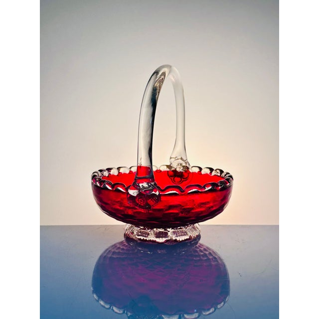 Handcrafted Murano glass candy dish in deep ruby ​​and clear glass with embedded gold dust (oro) – one of the iconic...