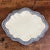 antique English creamware or pearlware oval platter, likely dating from the late 18th to the early 19th century (circa...