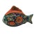 A fish—frozen in midswim—tells a tale more vivid than any sea. Its scales, each hand-painted with florid blossoms and...