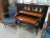 This elegant Louis XVI style French writing desk features a top enclosed bookcase for books or collectibles. A pull-out...