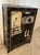 This is a beautiful Mid-Century (1950s) Chinese Black Lacquer Cabinet With Mother of Pearl Inlays. The beautiful inlays...