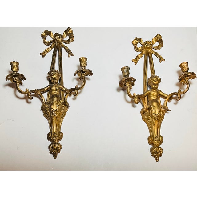 Early 20th Century Pair of Monumental 22” French Louis XVI Style Gilt Bronze Cherub Two-Light Wall Sconces With Ribbon Bows For Sale In Los Angeles - Image 6 of 7