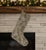 This one-of-a-kind Christmas stocking is hand-cut from a genuine vintage wool kilim in a soft sage green and olive...