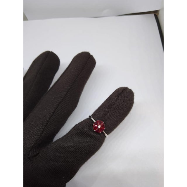 Gemstone details Gold Purity: 18K Solid Gold Ruby: 0.66 cts Diamond: 0.02 cts 18K gold Net weight: 2.40 grams Gross...