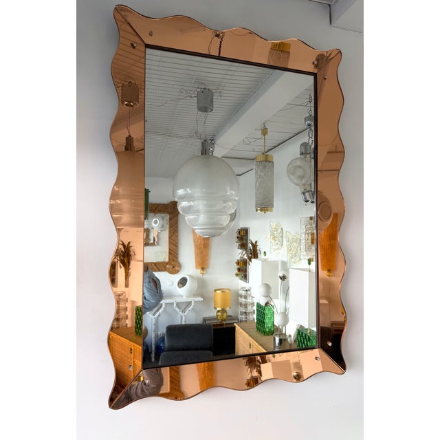 Mid-Century Modern wall mirror pink glass, with rose glass decor on corners, nice dimensions for this type of mirror by...