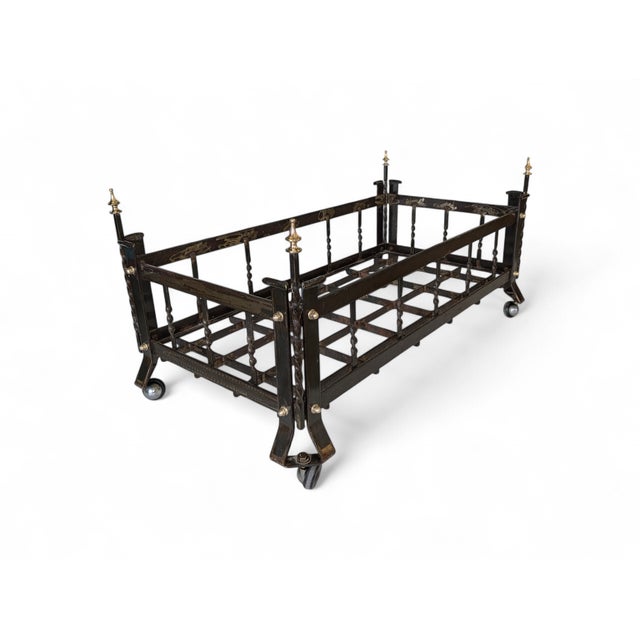 This refined, classic-style log holder combines the solidity of wrought iron with warm brass accents, offering a...