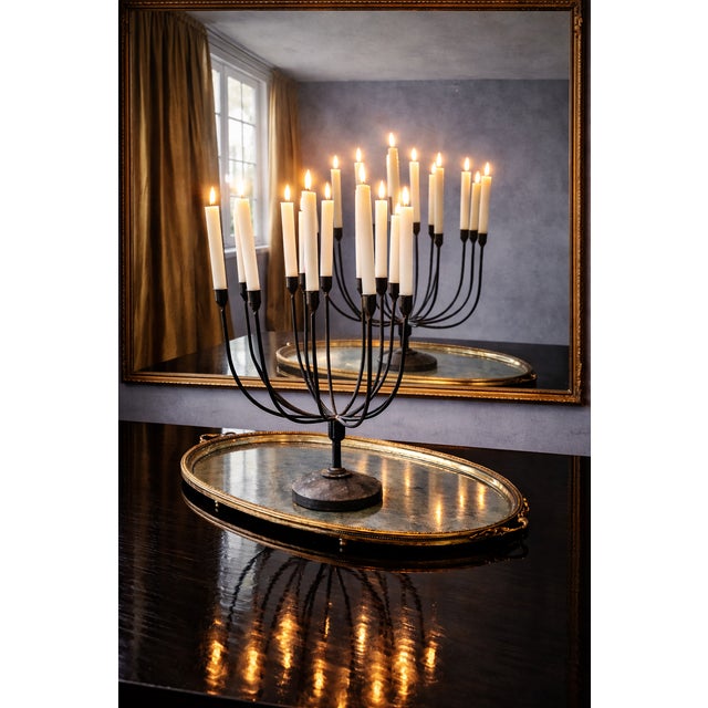 Impressive large-scale wrought iron candelabra dating 1990's. This sculptural Brutalist piece stands 21 inches tall and...