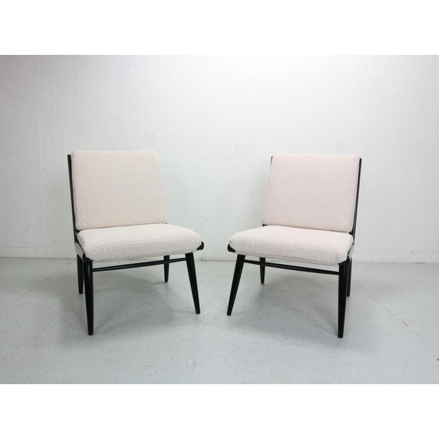 Hans Mitzlaff for Eugen Schmidt Soloform, two armchairs / lounge chairs, 'Boomerang' model, wood, fabric, designed in...