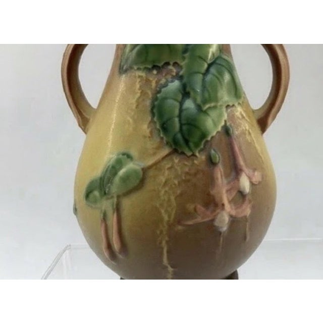 Beautiful vintage Roseville Pottery Fuchsia vase dating to circa 1938, featuring the desirable double-handled form and...