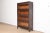 A gorgeous antique Arts & Crafts mahogany four-stack barrister bookcase By Macey USA, circa 1920s Measures: 35.25"W x...