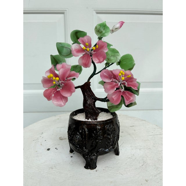 A cheerful & colorful flowering potted faux Jade or bonsai plant. Large bright blooms in pink and yellow surrounded by...