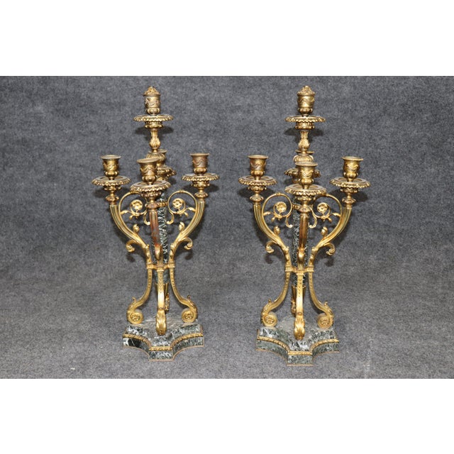 Pair of French Louis XV-Style Marble and Bronze Candelabra, Early 20th Century This handsome pair of French Louis XV-style...