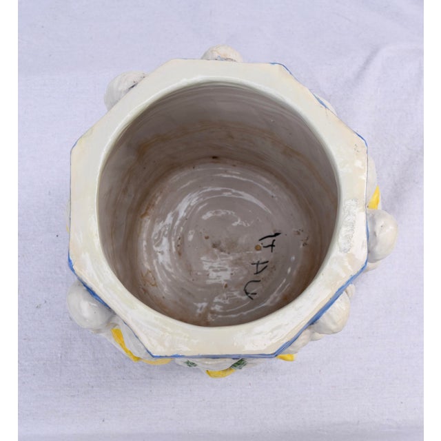 A scarcely seen early 20th century high relief hand made & painted Majolica pottery planter in the manner of Della Robbia....