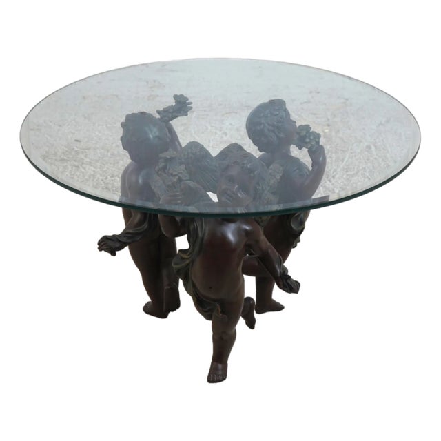 Beveled Glass Top Bronze Finish Cherub Base Cocktail Table For Sale