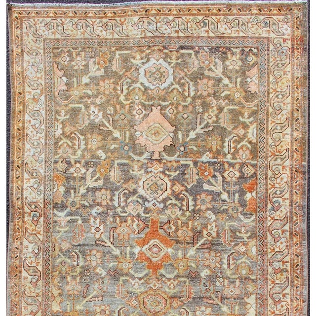 Measures: 4'4 x 9'4. Antique Persian Sultanabad Rug With A Soft Sky Blue Field with Stylized Palmette. Keivan Woven Arts /...