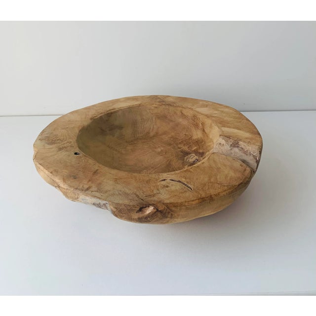 Use it to serve salad or photograph jewelry, this organic looking natural wooden bowl is a must for any modern or...