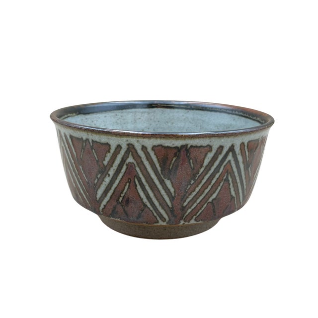 A mid-century stoneware bowl designed by Marianne Starck for Michael Andersen & Sons, handmade on the island of Bornholm,...