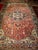 An outstanding oversized Persian Heriz Karajah rug from the early 1900s, handwoven in the Karajah village of Northwest...