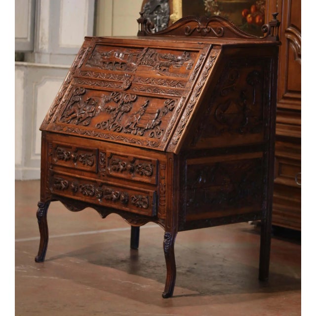 Make a statement in a study, library, or living room with this exceptional antique French secrétaire à abattant, crafted...