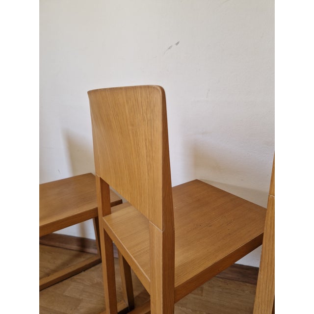 Set of 4 Pedrali Chairs, 1990s. Set of 4 minimalist chairs by Pedrali, made of solid wood with a geometric frame and...