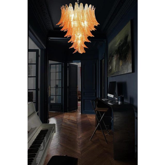 Beautiful and huge Italian Murano Chandelier composed of 75 splendid amber glasses that give a very elegant look. The...
