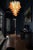 Beautiful and huge Italian Murano Chandelier composed of 75 splendid amber glasses that give a very elegant look. The...