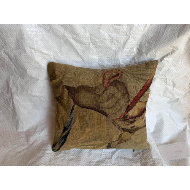 This luxurious decorative pillow showcases an authentic fragment of a 16th-century Brussels Renaissance tapestry,...