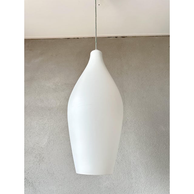 Beautiful mid - Century design. 1970s pendant lamp made by the German company Peill and Putzler. This model is the...