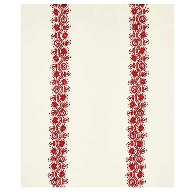 Inspired by the folkloric embellishments on an antique Ukrainian blouse, Theodora Embroidery features a pair of vertical...