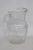 This gorgeous Depression Era Pitcher is made of glass. This stunning clear glass Pitcher has lovely vintage design; it...