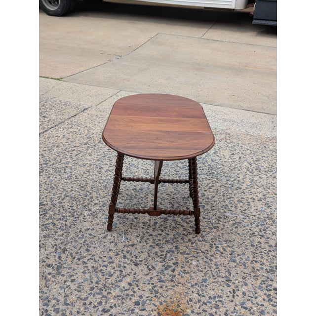 Bring timeless charm to your home with this authentic Vintage Americana Style Drop Leaf Side Table. Embodying classic...