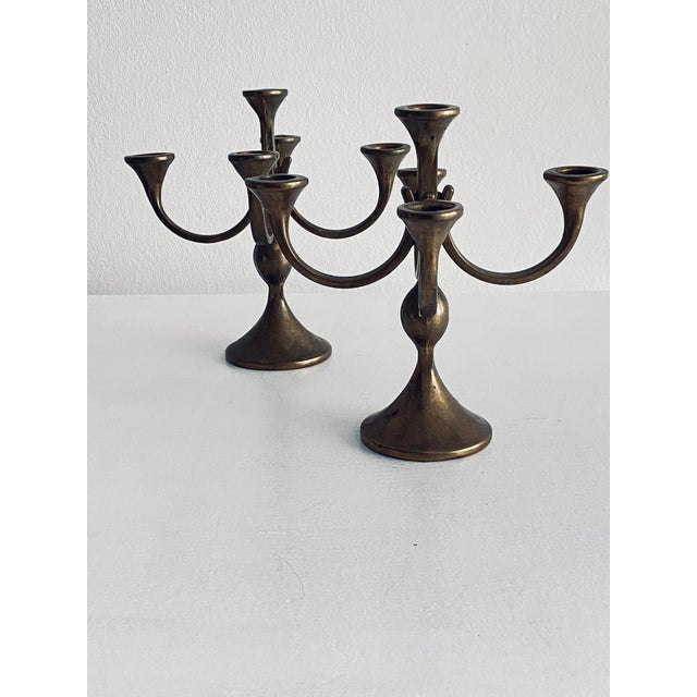 A timelessly beautiful pair of candlesticks made of solid brass. Mid-century design that integrates seamlessly into any...