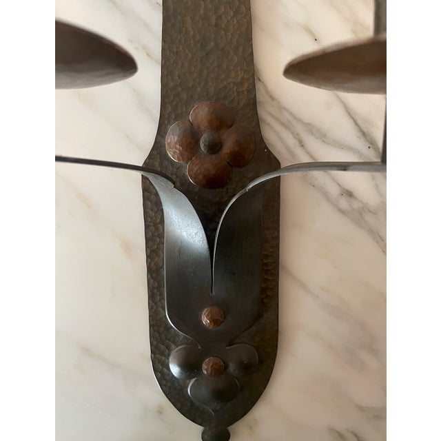 Set of two vintage, unique arts and crafts style brass and copper hand-hammered candle holder sconces. Hook on back for...