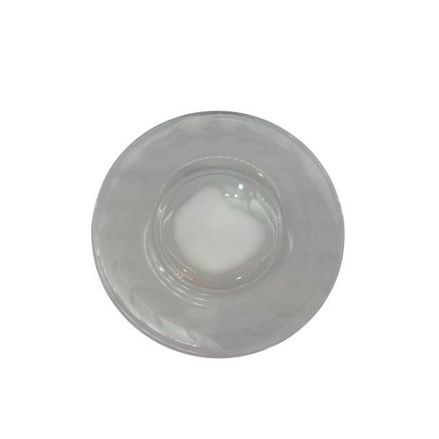 This set of twelve bread & butter plates from Anchor Hocking feature the Laurel design. Manufactured in the mid-twentieth...