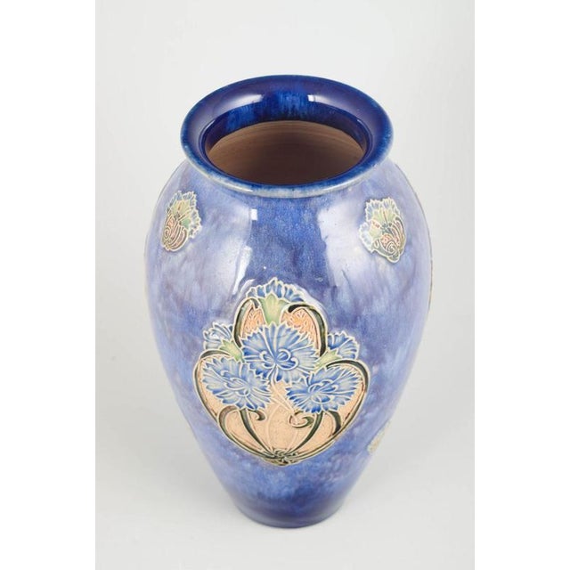 Royal Doulton Art Nouveau vase, 1930s. Elegant Art Nouveau vase made in glazed stoneware with a deep blue flowing glaze...