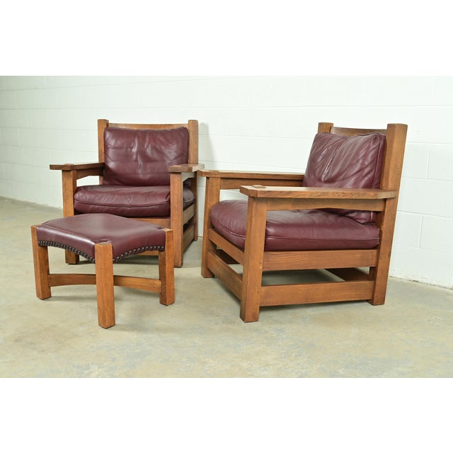 An exceptional pair of Mission or Arts & Crafts style Eastwood lounge chairs with ottoman By L. & J.G. Stickley USA, 1999...