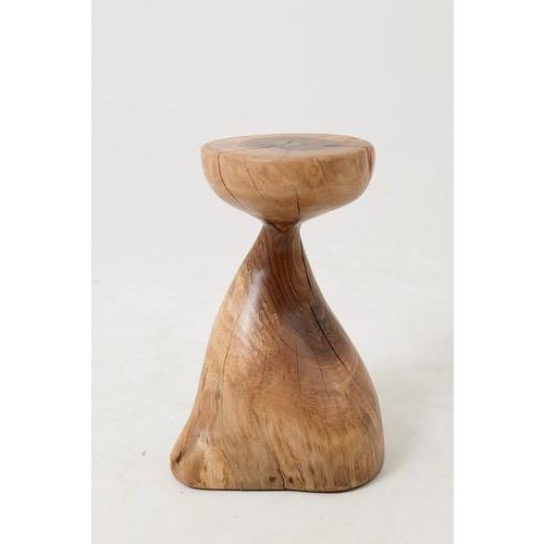 This is one of those pieces where the wood and the maker seem to have arrived at the form together. Carved from a single...