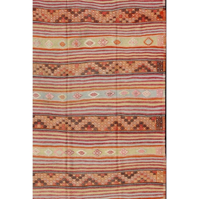 Turkish Kilim Vintage Rug With Assorted Stripe Design in a Variety of Colors For Sale - Image 4 of 13