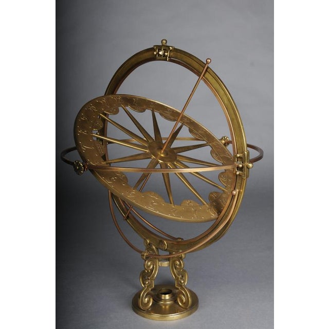 Stylized Brass Armillary Sphere/Celestial Globe, 20th Century The object shown is a decorative armillary sphere (also...