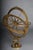 Stylized Brass Armillary Sphere/Celestial Globe, 20th Century The object shown is a decorative armillary sphere (also...