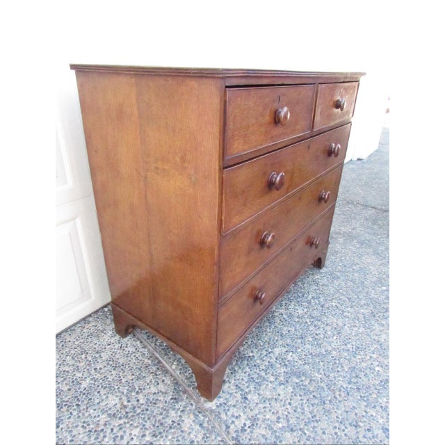 Antique English oak chest of drawers, c.1850 Having a molded rectangular top with ebony stringing. Below are two short and...