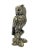This detailed sculpture depicts an owl perched on a lifelike tree trunk. The surface is carefully modeled, emphasizing the...