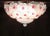 Ceiling with Murano glass flowers worked on the plate and hand transparent color with colorful flower -shaped fixing...