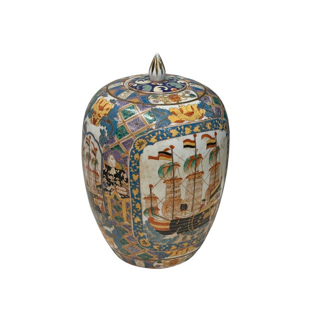 This decorative ceramic ginger jar features a rich, polychrome glaze palette rendered in the Namban style. The body is...