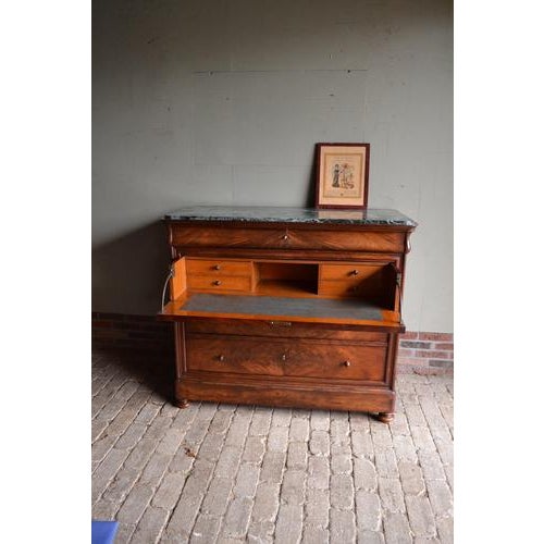 19th-century French mahogany chest of drawers with a secretary. It is 110 cm high, 128 cm wide, and 59 cm deep. It has...