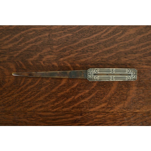 A gorgeous antique Arts & Crafts or Art Deco period sterling silver on bronze desk letter opener By Heintz Art Metal Shop...