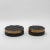 The "Coco" round box in black shagreen with bronze patina brass exudes unparalleled luxury and craftsmanship. Its...