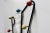 - Multi-colored coatrack in style of Roger Feraud - Produced in the 1950s - The coatrack is wall mounted - The coat hooks...